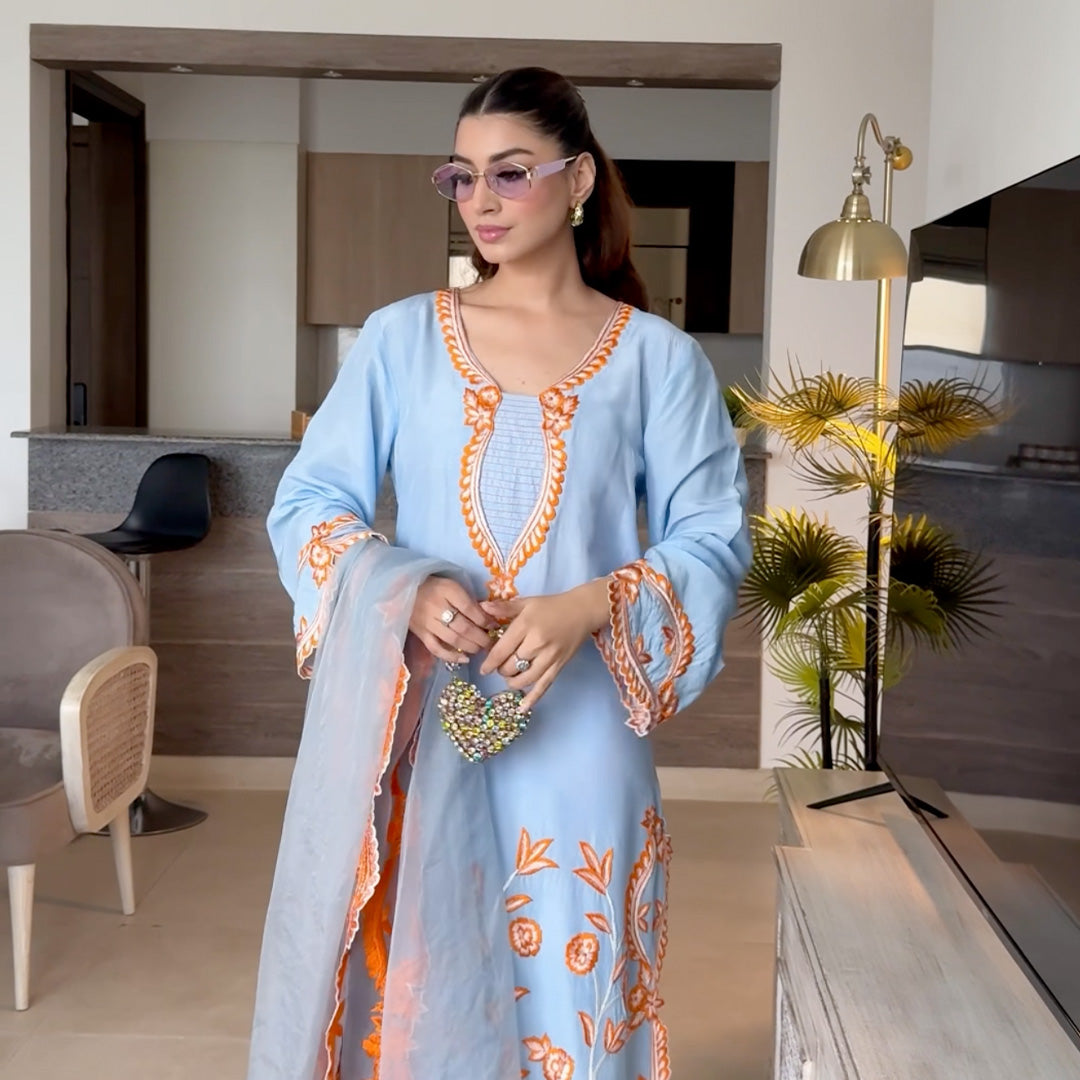 Our Ice Blue Suit in Korean Silk and Organza Duppatta with Hand Crafted Embroidery and Applique Work.