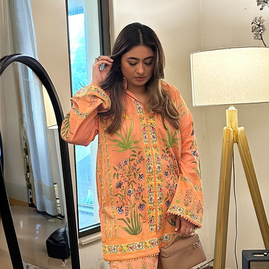 Our Peach Colour Floral Lawn Cord Set is a treat for the Eyes.