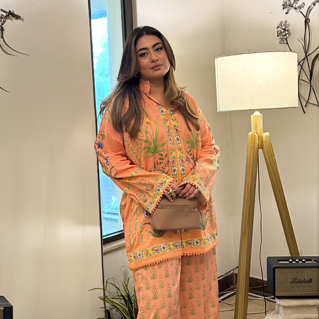 Our Peach Colour Floral Lawn Cord Set is a treat for the Eyes.