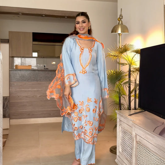 Our Ice Blue Suit in Korean Silk and Organza Duppatta with Hand Crafted Embroidery and Applique Work.