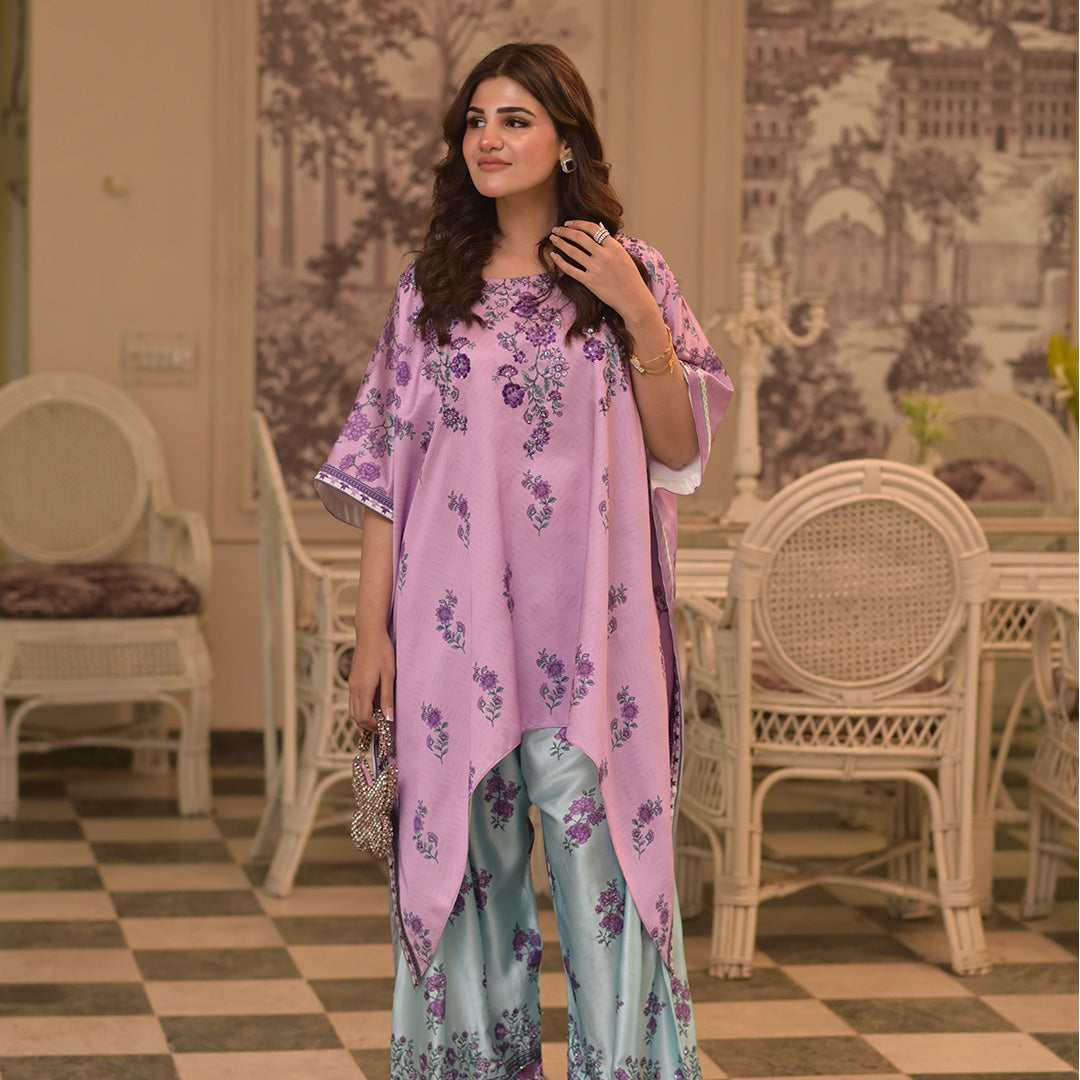 On pure shamoz silk digital printed three piece stitched suit paired with Farsi shalwar, with hand embellishments