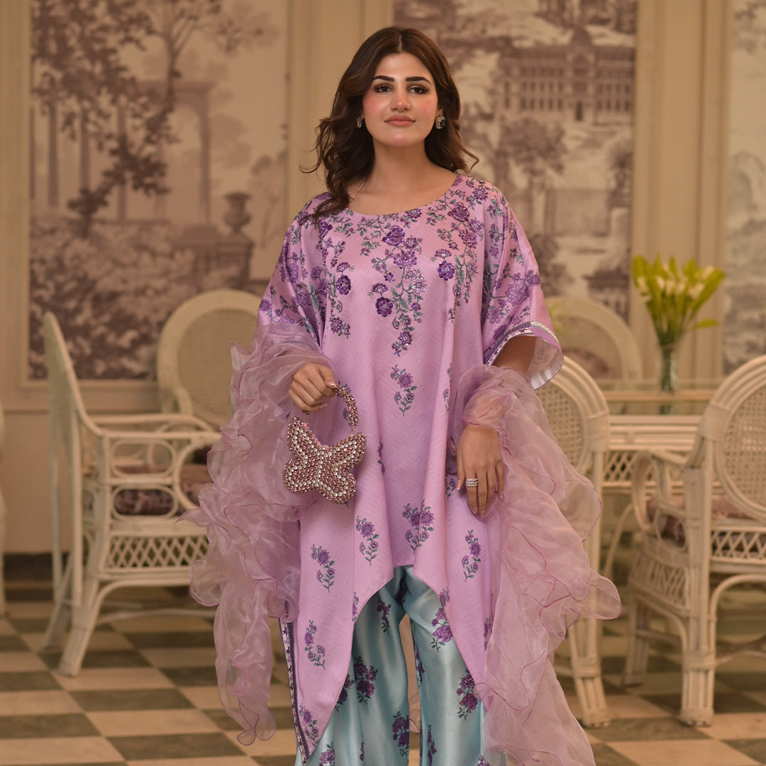 On pure shamoz silk digital printed three piece stitched suit paired with Farsi shalwar, with hand embellishments