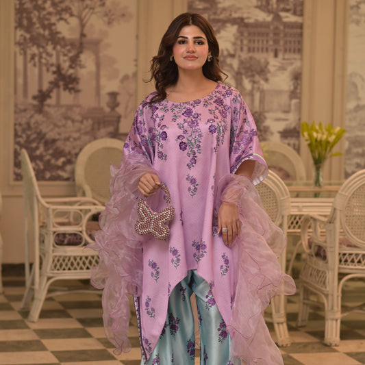 On pure shamoz silk digital printed three piece stitched suit paired with Farsi shalwar, with hand embellishments